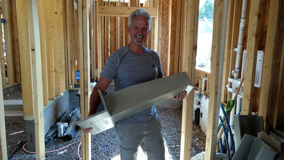 Phillip holding a Fiberspan Concrete Canale (Roof Scupper), About